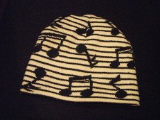 White Hat with Black Notes